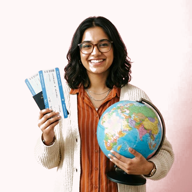 Happy student holding globe